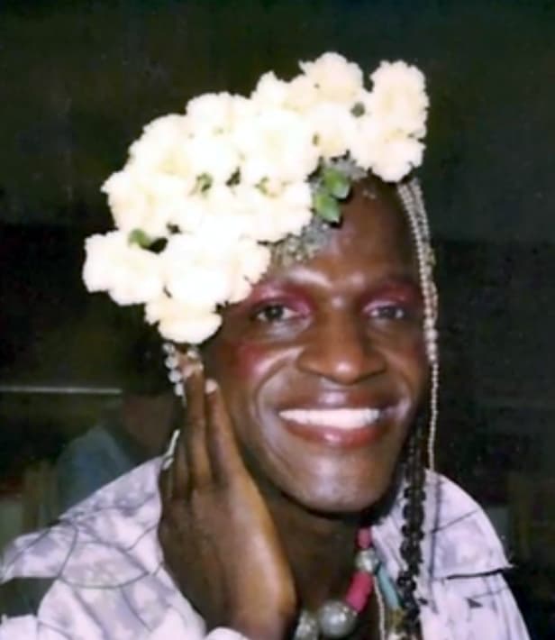 In July 1992, gay liberation leader Marsha P. Johnson’s body was found floating in the Hudson River shortly after that year’s gay pride parade. Police ruled that her death was a suicide but considering a large gash on the back of her head, several of Johnson’s friends and other community members had suspicions that foul play may have been involved in her passing. 